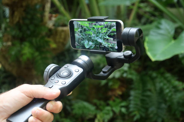 istock Smartphone recording a video and taking photos with gimbal 1439257855