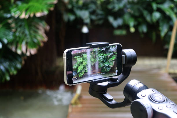 istock Smartphone recording a video and taking photos with gimbal 1439257862