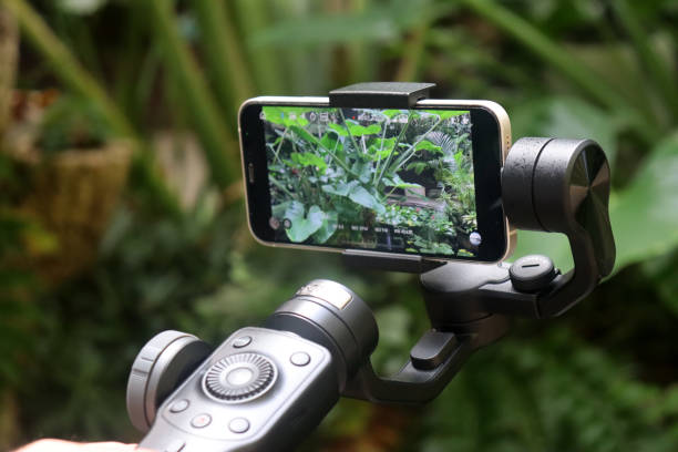 istock Smartphone recording a video and taking photos with gimbal 1439257878