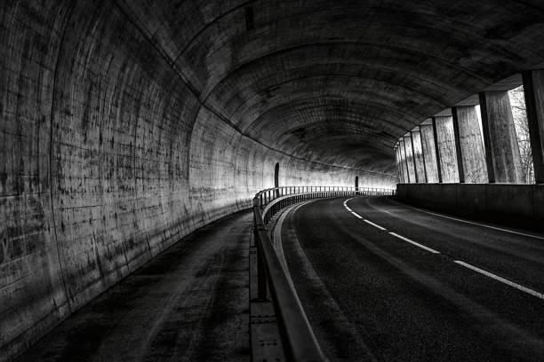 istock Horizontal view of an empty road in the tunnel 1439258088