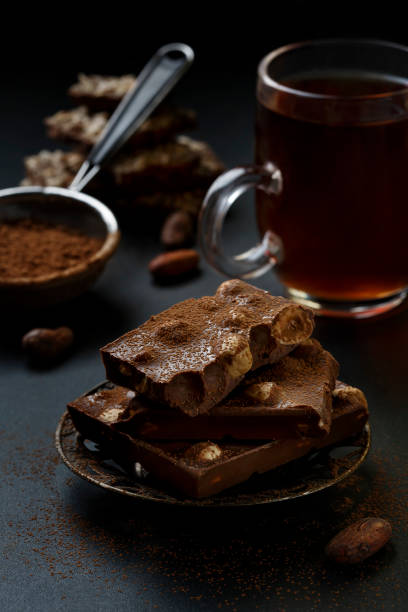 istock Chocolate chunks and cocoa powder. 1439258374