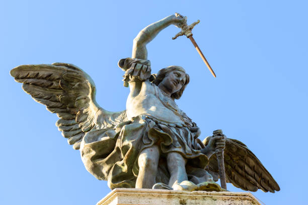 saint michael archangel statue at top of castel sant'angelo, rome, italy - roman statue angel rome imagens e fotografias de stock