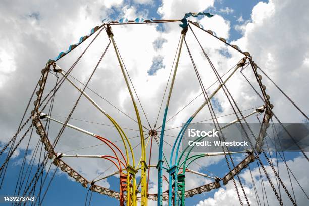 Low Angle Shot Of A Colorful Turning Carousel Ride Under A Bright Sky In Gyumri Leninakan Armenia Stock Photo - Download Image Now