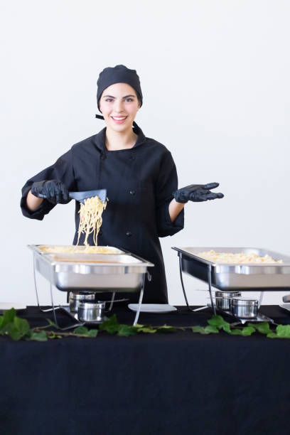 istock Smiling cook and ready to serve you 1439275219