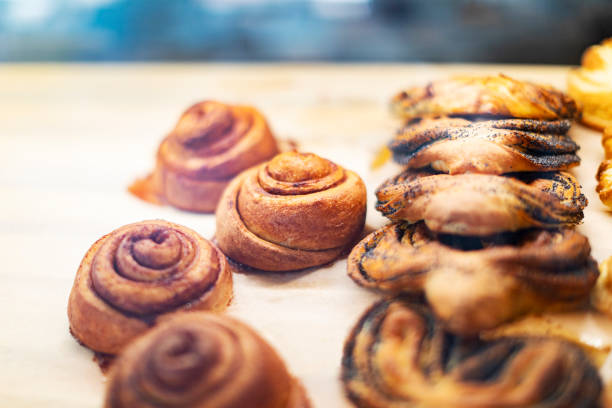 istock Bakery and pastry store showcase with tasty buns 1439277254