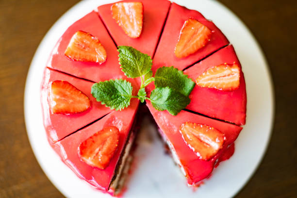 Strawberry cake at the table in cafe