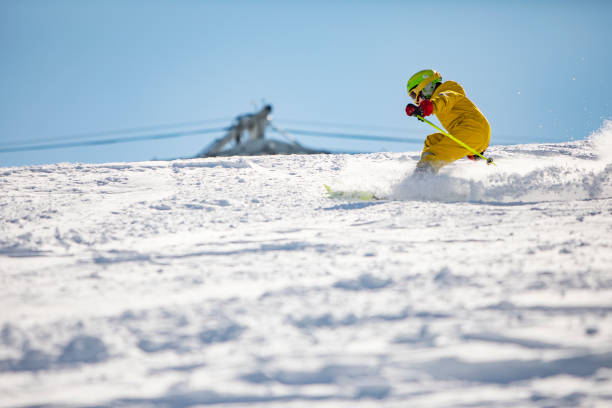 istock Boy skiing in mountains at ski resort 1439279212