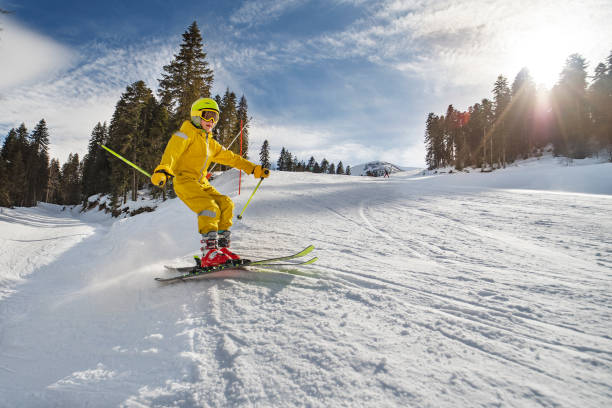 istock Boy skiing in mountains at ski resort 1439279284