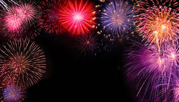 istock Celebration with Fireworks on the night sky. 1439285071