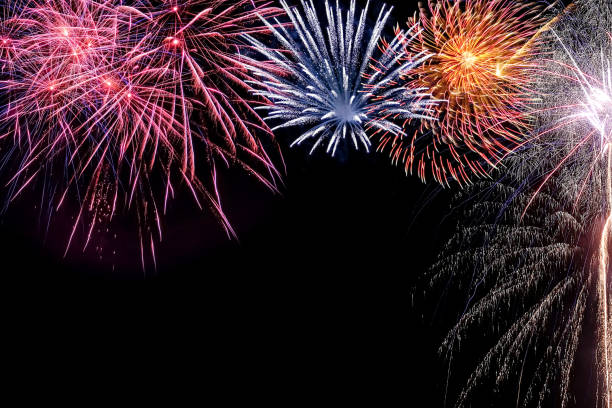 istock Celebration with Fireworks on the night sky. 1439285146