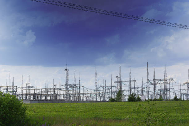 istock Electric poles against a dark sky. 1439288568