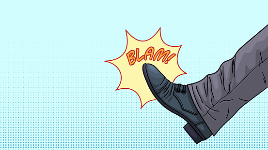 Leg close-up. A foot in a shoe in trousers kicks something. Background and template for illustrations.