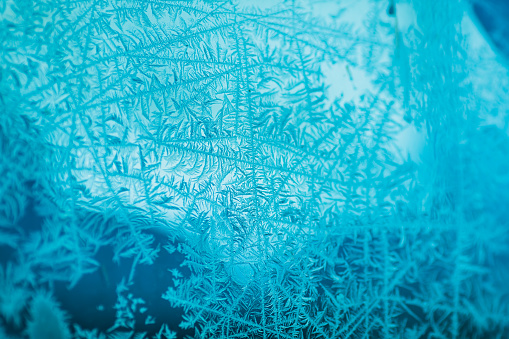Frost pattern on glass. Ice background. Copyspace. Cold weather. Climate. Frost