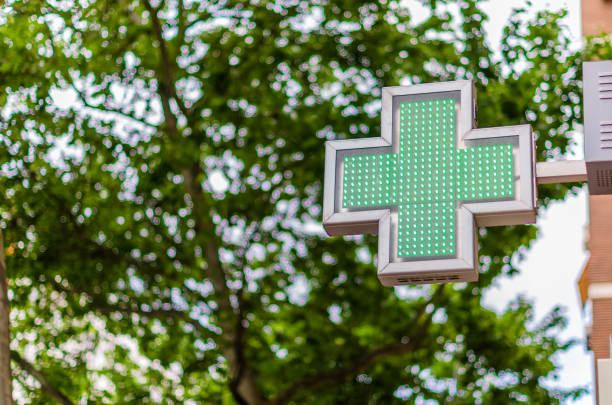 istock Green cross sign indicating  pharmacy 1439298664