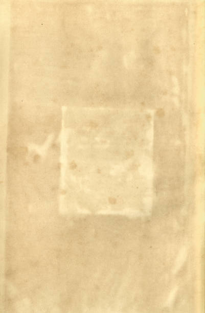 istock Vintage old paper background texture with faded square frame outline shape 1439300973
