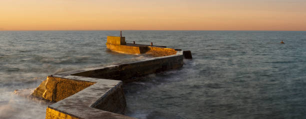 istock Sunrise on the zig-zag jetty, St. Monans, Scotland 1439307185