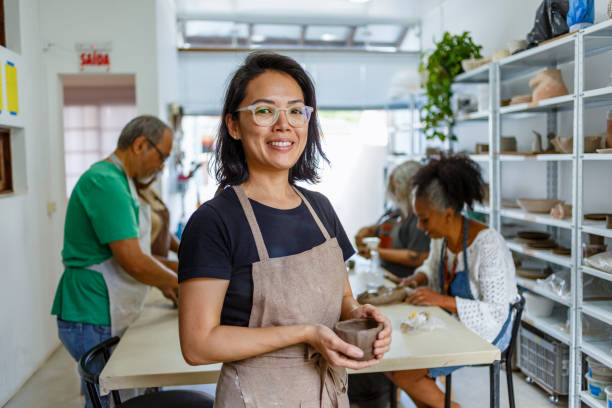 pottery teacher portrait pottery teacher portrait artist sculptor stock pictures, royalty-free photos & images