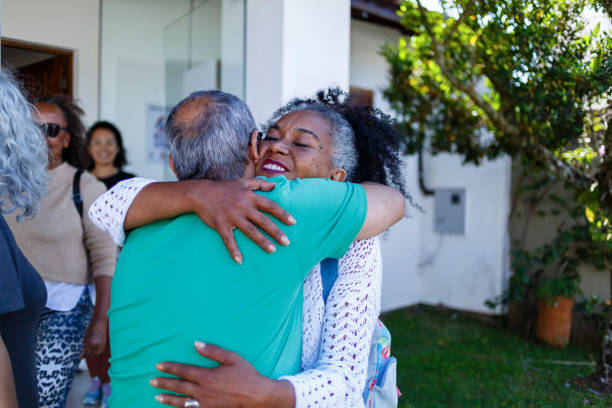 istock black woman hugging latin man 1439309030