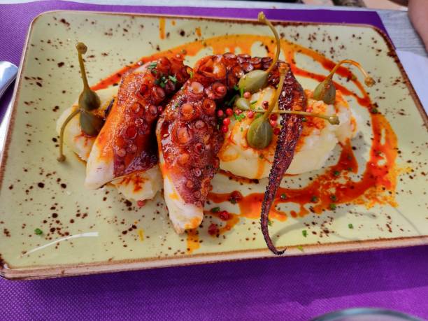 istock Grilled octopus with potato pure. Galician octopus. 1439309208