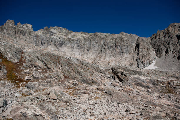 istock Sharp rocky ridge high on  13441 foot Apache Peak against a bright blue sky 1439310807