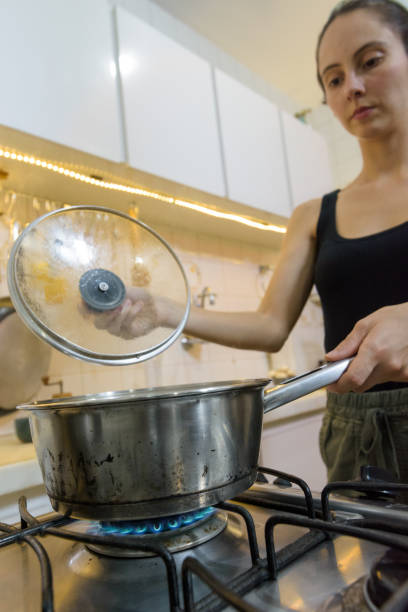 istock Girl checking if the food is ready 1439312607