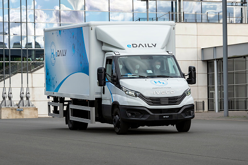 Hannover, Germany - 20 September, 2022: Iveco eDaily fuel cell vehicle driving on a street. This model is powered by Hyundai.
