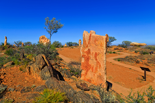 Public park with stone sculptures at Broken Hill mining city of Australian Far West NSW on a hot summer day.