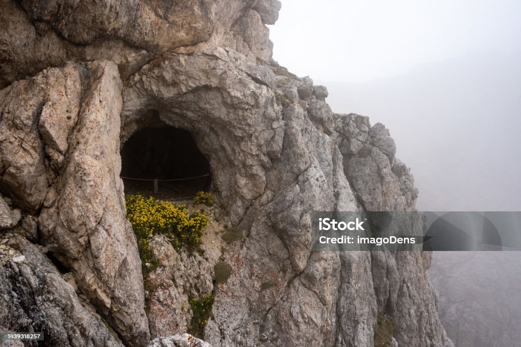 A tunnel in Mount Lagazuoi, part of a defense system in the First World War at the Dolomite Alps, South Tirol A tunnel in Mount Lagazuoi, part of a defense system in the First World War at the Dolomite Alps, Autonomous Pronvince of South Tirol Dolomites Stock Photo