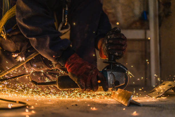 istock closeup of sparks caused by worker welding metal 1439318921