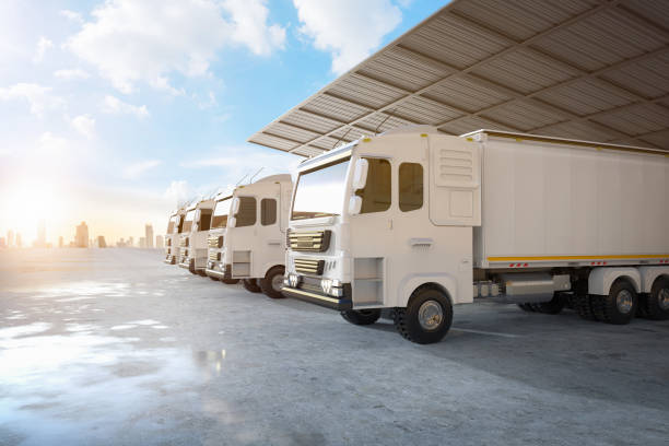 istock Group of logistic trailer trucks or lorries at warehouse 1439326679
