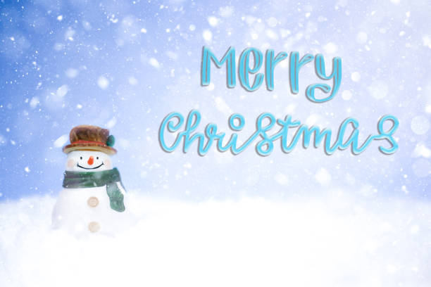 Merry Christmas card with snowman in the snow