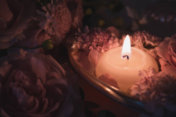 istock Relaxing time with candles and flowers. 1439332787