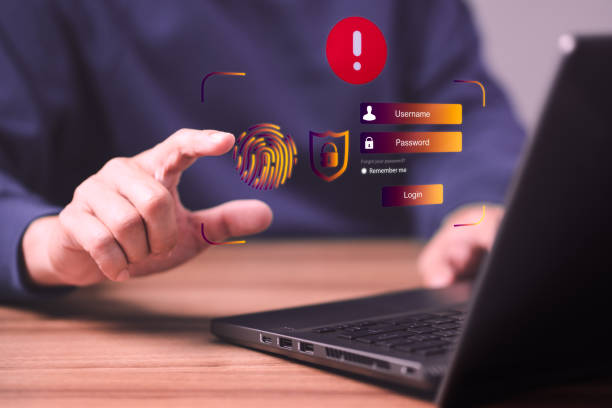 istock Man typing login and password, cyber security concept, Secure encryption and access to the user's private information to access the Internet. exclamation mark. 1439334134
