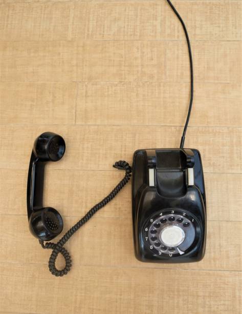istock Old black retro rotary Telephone 1439340973