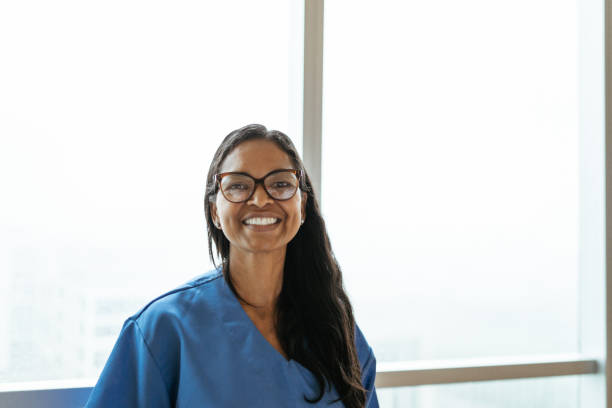 istock Portrait of a smiling nurse 1439345275