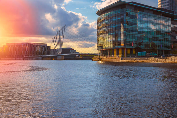 istock Foot bridge cross Manchester ship canal, connecting between Media City and Imperial War Museum at Salford quays in Manchester city, England 1439347310