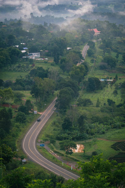 istock Aerial view of car driving 1439352132