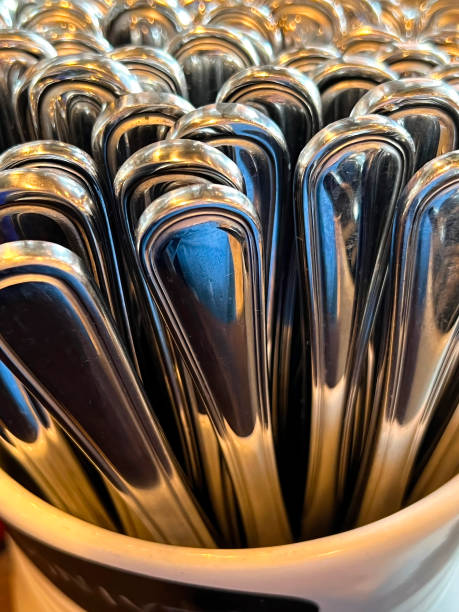 istock Container Of Shiny Silver Table Knives 1439360516