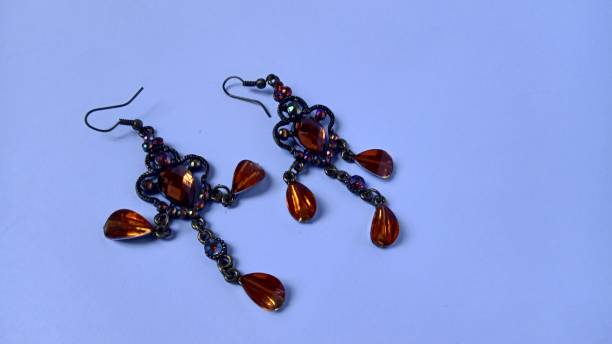 istock Big earrings that had brown crystals 1439368756