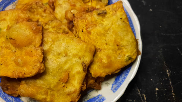 istock Homemade fried tempeh on a black background 02 1439369548