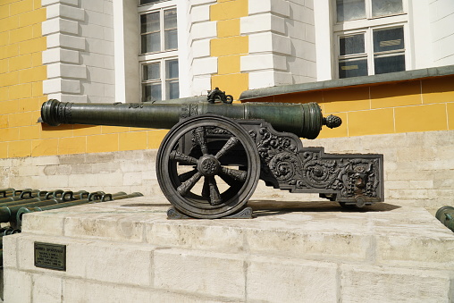 Kremlin, Red Square, Moscow, Russia - August 16, 2022: An old cannon and barrels