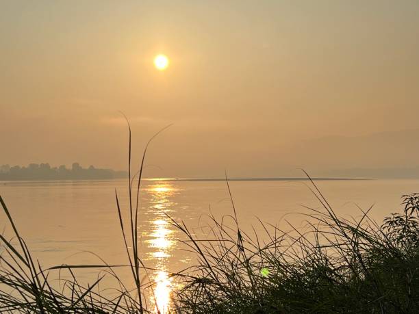Sunrise at Khong river stock photo