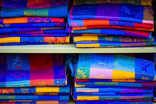 Tropical men shirts on display in the market.traditional clothing worn as a shirts by Polynesians and other Oceanic peoples.