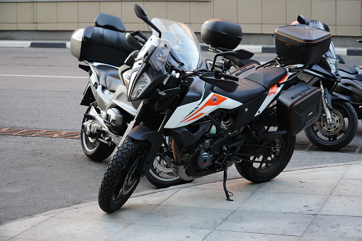 Moscow, Russia - August 16, 2022: motorcycle parked on the motorcycles parking lot on city street