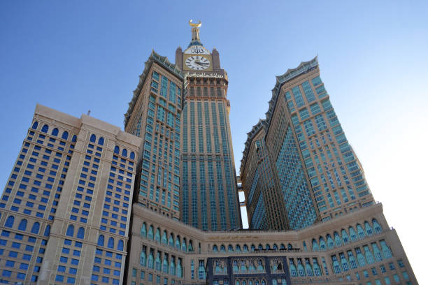 Skyline with Abraj Al Bait Mecca, Saudi Arabia - January 9, 2013. Skyline with Abraj Al Bait (Royal Clock Tower Makkah) from lower angle. makkah royal clock tower stock pictures, royalty-free photos & images