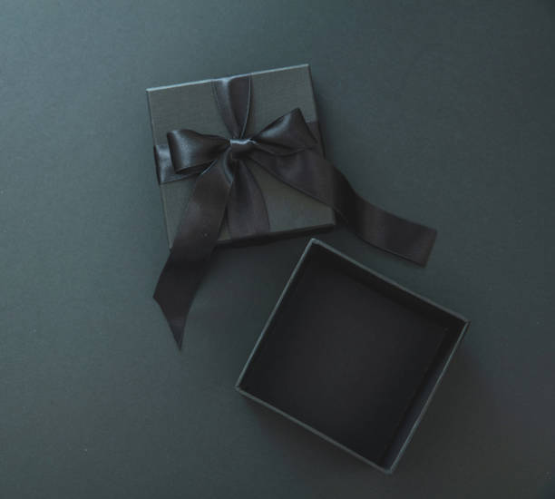 istock Black Friday sale template, Gift box open with ribbon, overhead. 1439388795