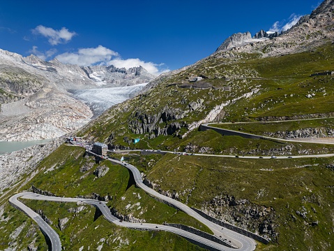 A drone shot of Swiss Mountain Roads, The Furka Pass and Susten Pass next to the Rhone Glacier