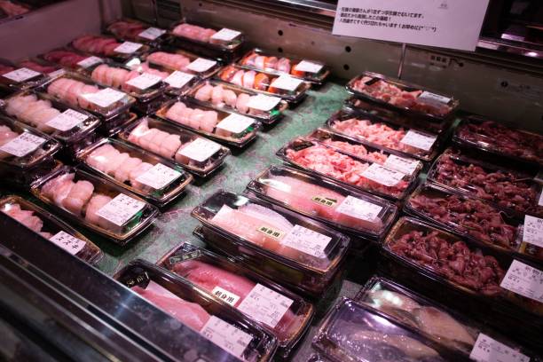 istock Market stall selling various seafood packed in containers 1439395315