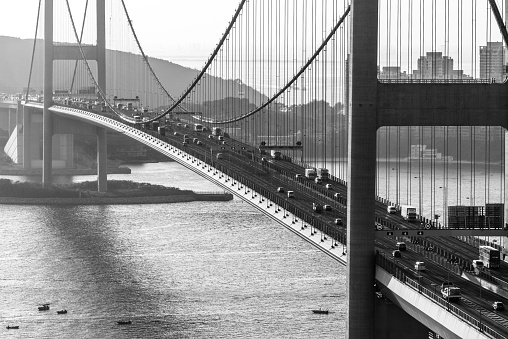 A greyscale shot of Tsing Ma Bridge in Hong Kong