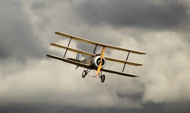 istock Yellow Antonov an-2 in the dark cloudy sky 1439412646